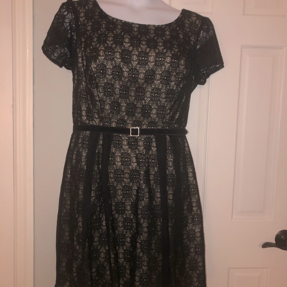 Black lace over gold belted skater dress